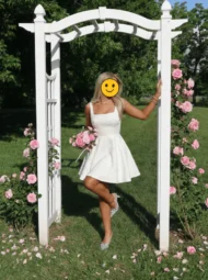 If I had a small chest, the XL would fit perfectly, but I don't. My breasts (DDD) spill out both the sides and the slit, which looked small and demure on the product photos but is actually very deep. It honestly feels too obscene to wear as a wedding guest (at least to this particular family event). The neck is also extremely tight, though that could have been fixed with moving the buttons to the end of the tab. The button loops are not stretchy, making it almost impossible to hook by yourself (I have lots of dresses/tops with that style and have no problem closing them alone when the loops stretch). Lulu's, please remember that larger sizes will also need larger neck sizes! I was so excited for this dress, and if the top were different it would be a win, but that one flaw is enough to make me hate how I look and feel in this dress.